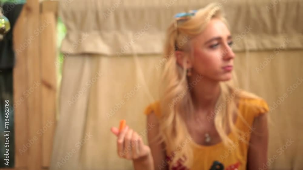 Closeup of charming blonde woman enjoying a lunch Closeup of charming blonde woman enjoying a lunch