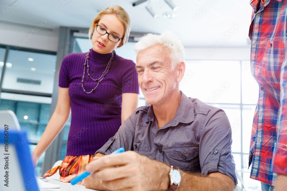 Obraz premium Co-workers working together