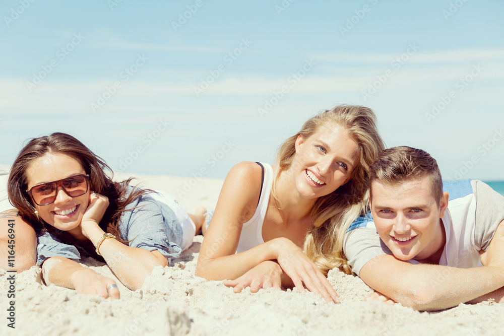 Company of young people on the beach Company of young people on the beach