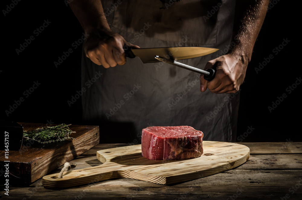 Chef butcher prepare beef steak