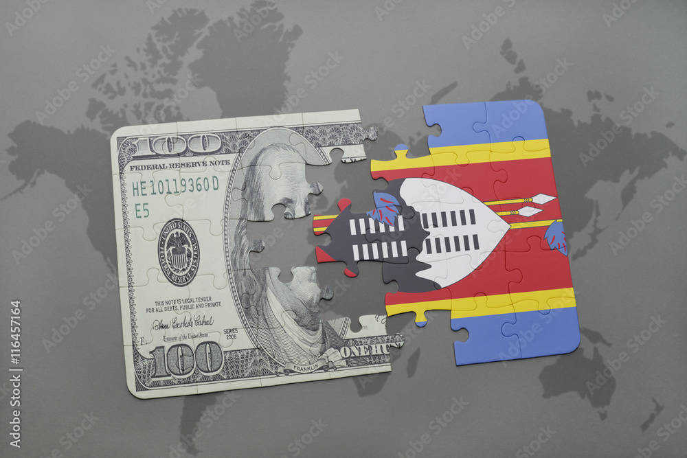 puzzle with the national flag of swaziland and dollar banknote on a ...