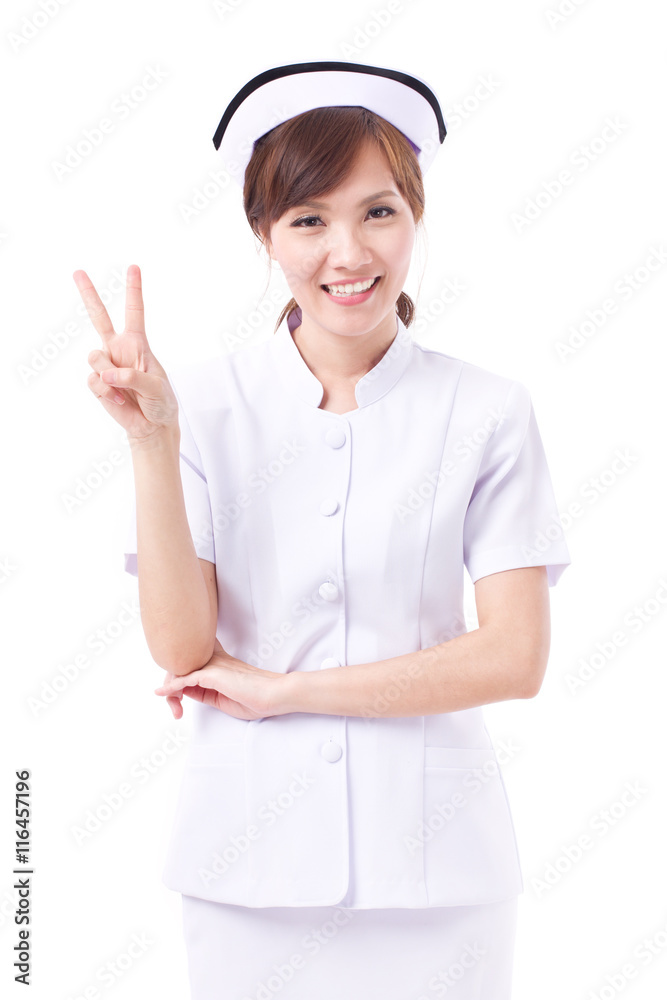 happy asian nurse pointing up 2 fingers, victory hand sign happy asian nurse pointing up 2 fingers, victory hand sign
