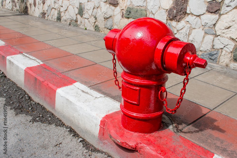 Asian fire hydrant on street. Typical red fire hydrant asian on street. Red fire Hydrant vintage style.