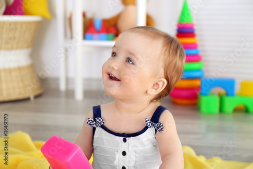 Baby with bright toy blocks...