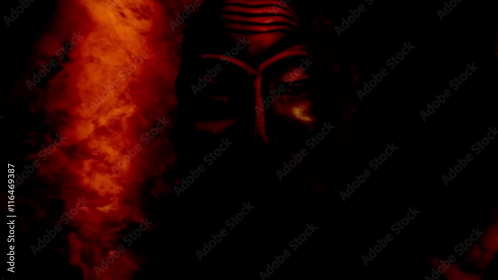 Gentle Light Moves on Mongolian Mask in the Dark Closeup Gentle Light Moves on Mongolian Mask in the Dark Closeup
