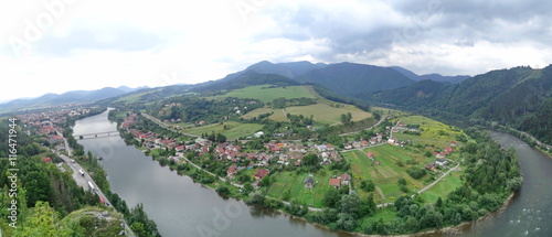River Vah near Strecno, Slovakia - View from Ruins of Medieval Castle Strecno Built in the First Half of 14th Century on One Hundred Meters High Hill above River Vah photo