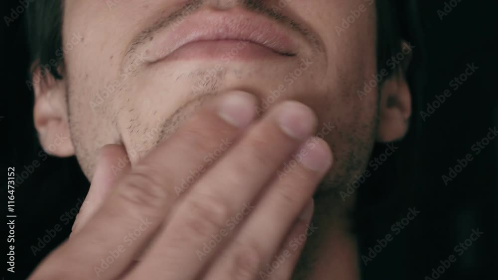 Close-up of a young man with bristles