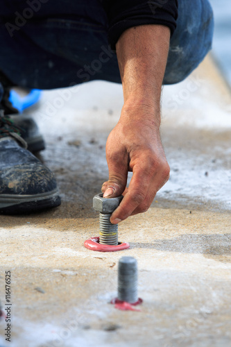 Setting stud bolt into adhesive chemical  anchor