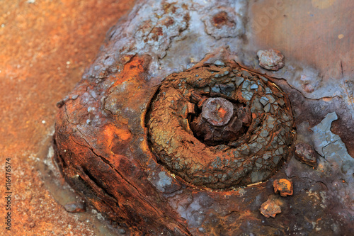 фотографія Corrosion is a natural process, which converts a refined metal to a more stable