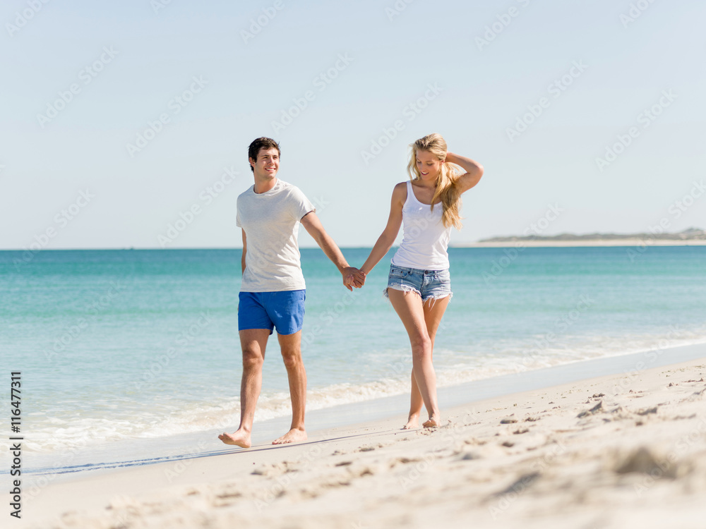 Romantic young couple on the beach