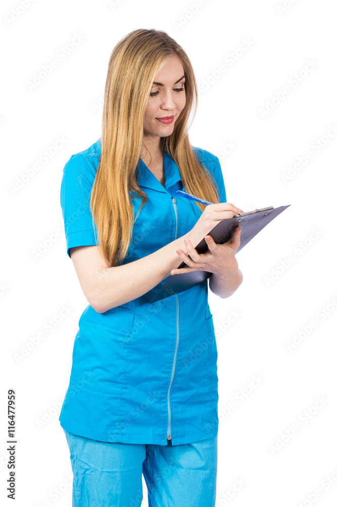 Young blonde woman doctor making notes in the medical record, isolated on white background Young blonde woman doctor making notes in the medical record, isolated on white background
