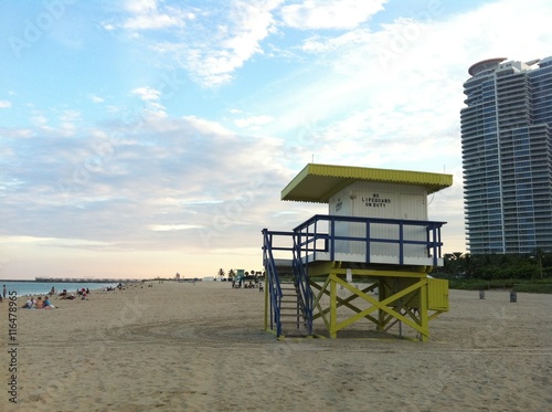 Lifeguard tower during sunset at Miami South Beach with colorful cloud and blue sky