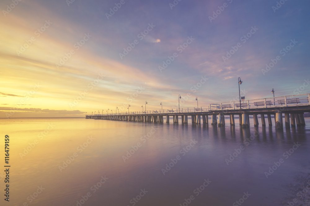 wooden pier on the Baltic Sea, Gdynia Orłowo, Poland.Seascape,sunset, retro effect

