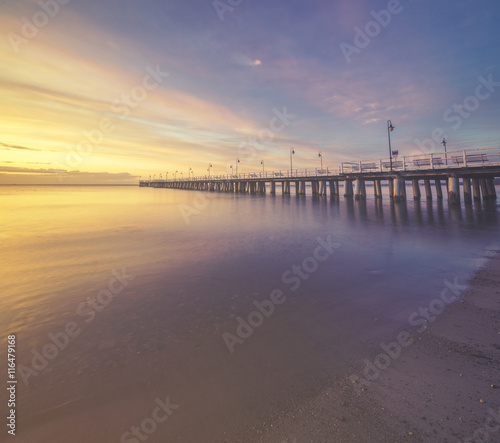 wooden pier on the Baltic Sea, Gdynia Orłowo, Poland.Seascape,sunset, retro effect
