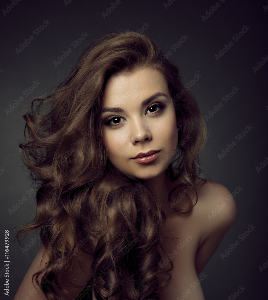 Portrait of a young beautiful brunette girl with long black hair
Portrait of a young beautiful brunette girl with long black hair