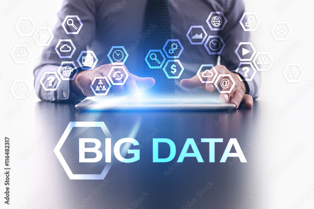 Businessman is using tablet pc and selecting Big data icon. Businessman is using tablet pc and selecting Big data icon.