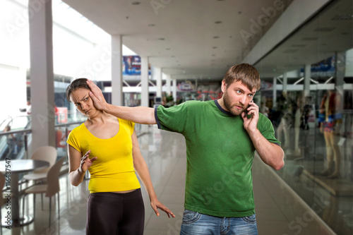 Tablou pe pânză Man talking by mobile phone