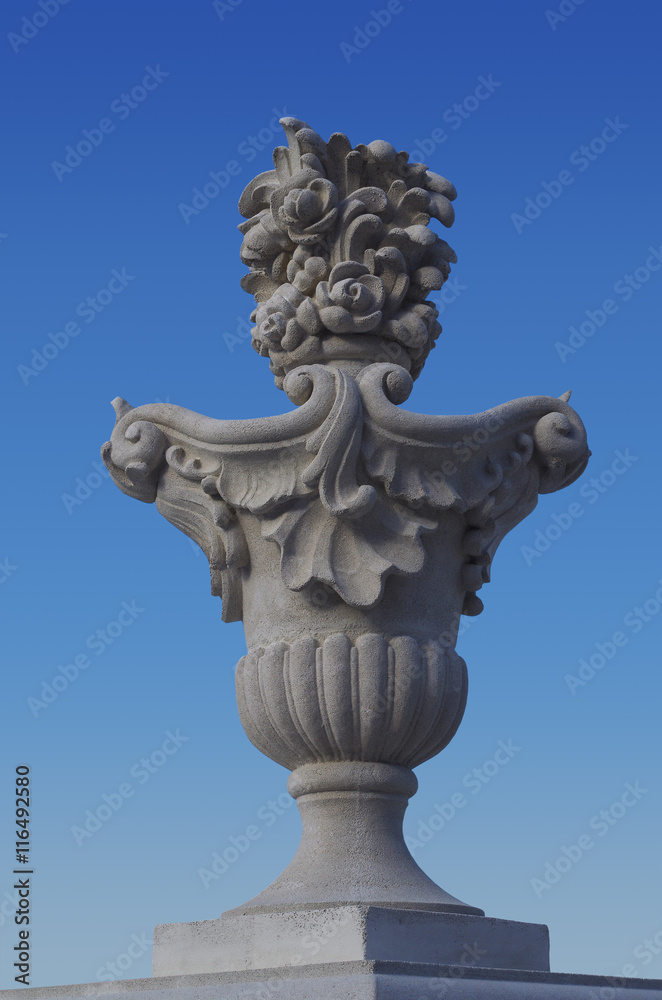 Decorative vase as a design element exterior against a blue sky