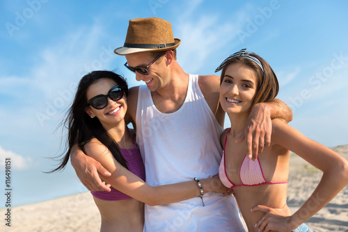 Foto Handsome man resting on the beach