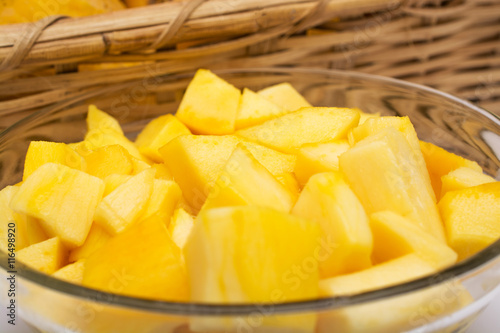 Fresh and juicy slice of mango in bowl
