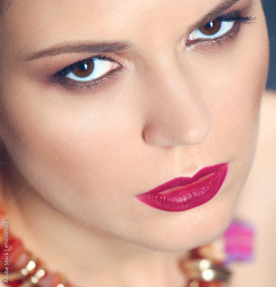 Portrait of young beautiful brunette woman in beads Portrait of young beautiful brunette woman in beads