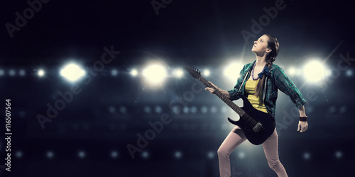 Female rock guitarist . Mixed media © Sergey Nivens