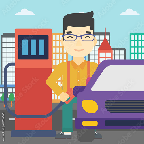 Worker filling up fuel into car.