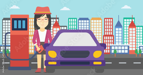 Worker filling up fuel into car.