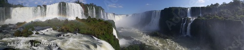 Panorama from Iguazu Falls with a rainbow