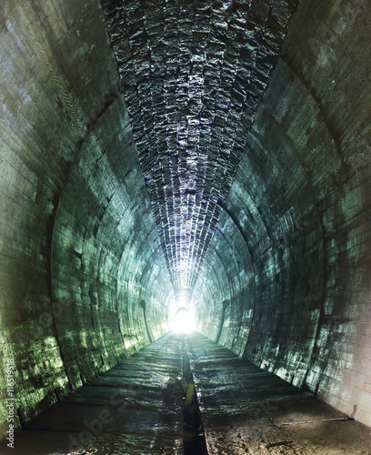 Inside of a grungy tunnel