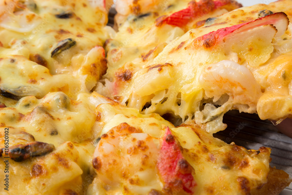 Hot piece of pizza with melted cheese Hot piece of pizza with melted cheese
