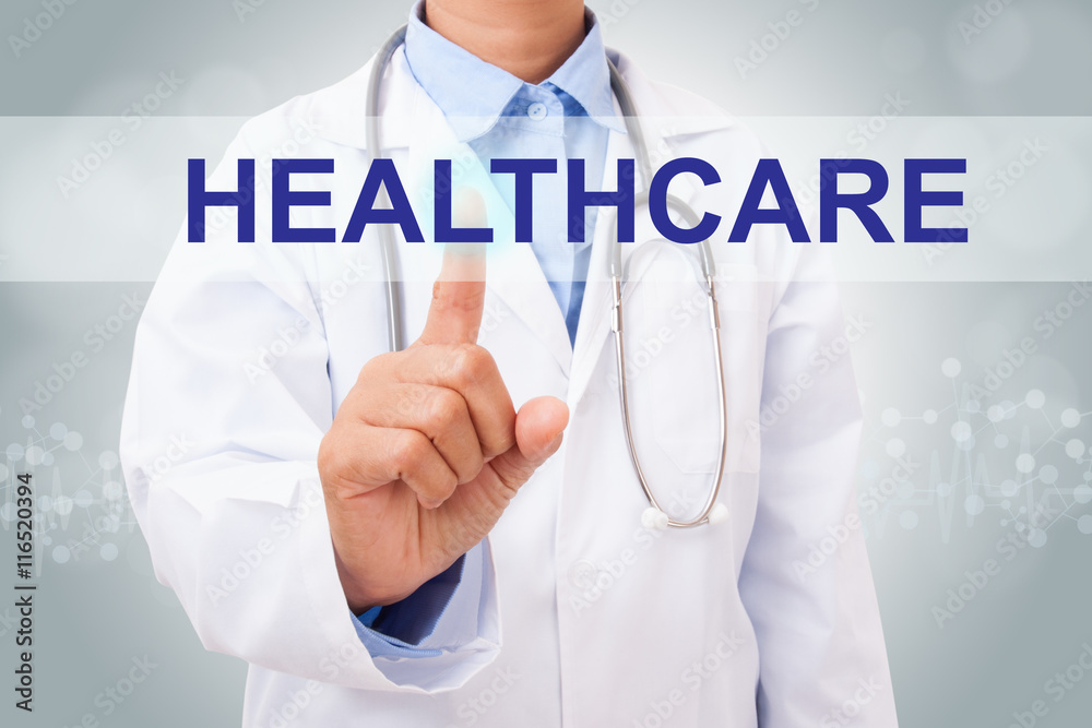 Doctor hand touching HEALTHCARE sign on virtual screen. medical concept Doctor hand touching HEALTHCARE sign on virtual screen. medical concept