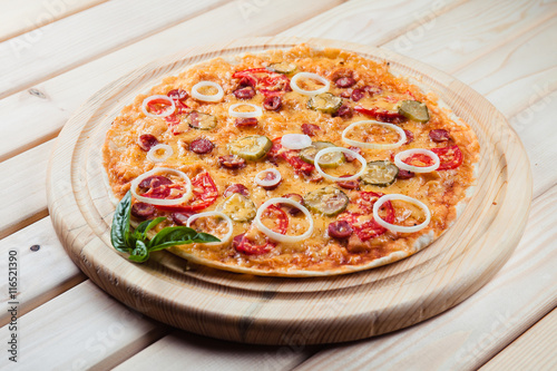 Assorted Pizza on the wooden background