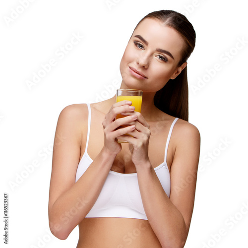 attractivesmiling woman holding glass of orange juice isolated on white