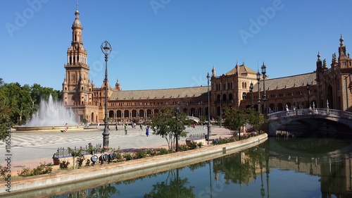 Plaza de Espana in Seville, Spain. Tourists are visiting the Plaza de Espana.