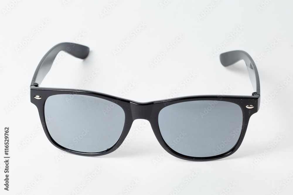 colored summer sunglasses on a white background colored summer sunglasses on a white background