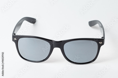 colored summer sunglasses on a white background