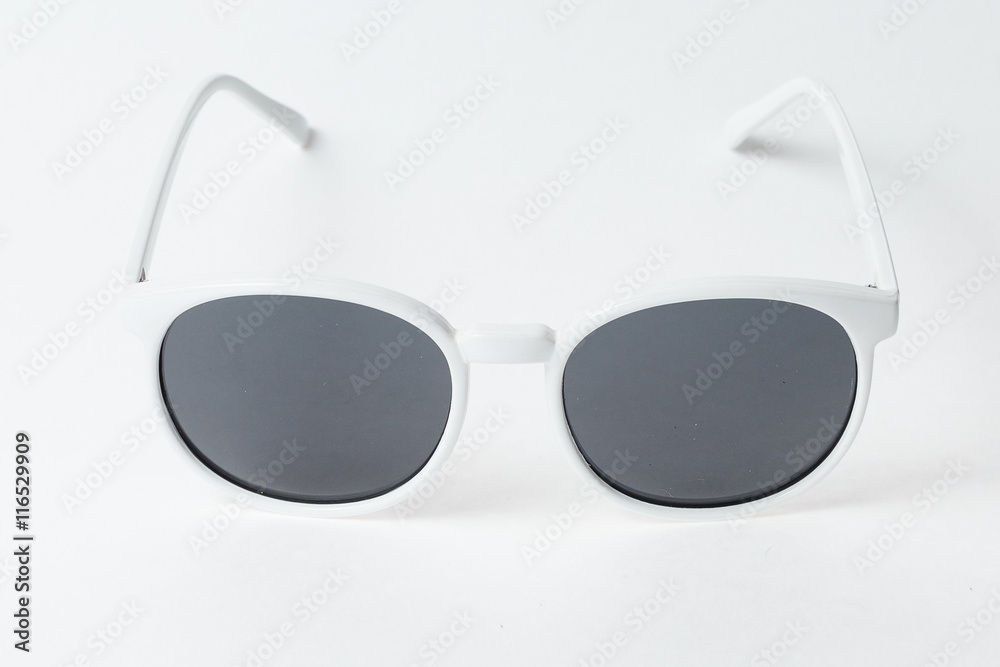 colored summer sunglasses on a white background colored summer sunglasses on a white background
