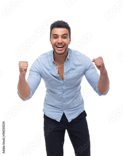 Handsome business man excited hold hands fist up shouting