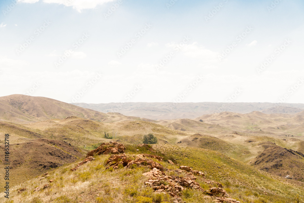 The parched rocky hills and sky summer day.