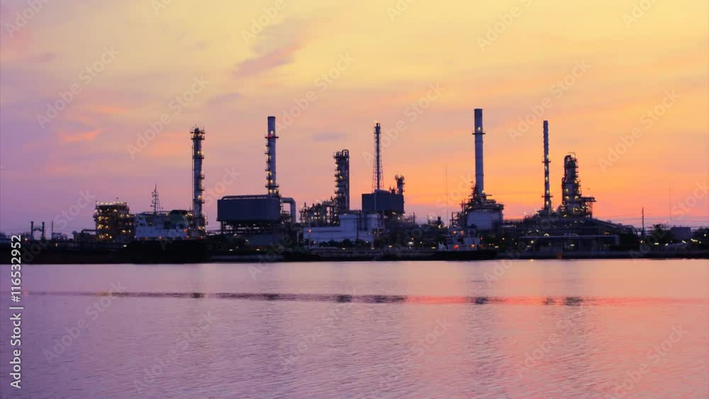 Time Lapse, The refinery in the morning light reflected river. Time Lapse, The refinery in the morning light reflected river.