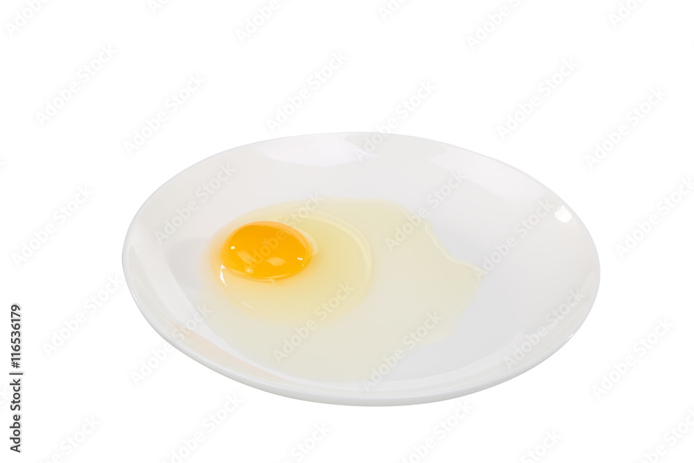 Yellow yolk close up shot on the plate Yellow yolk close up shot on the plate