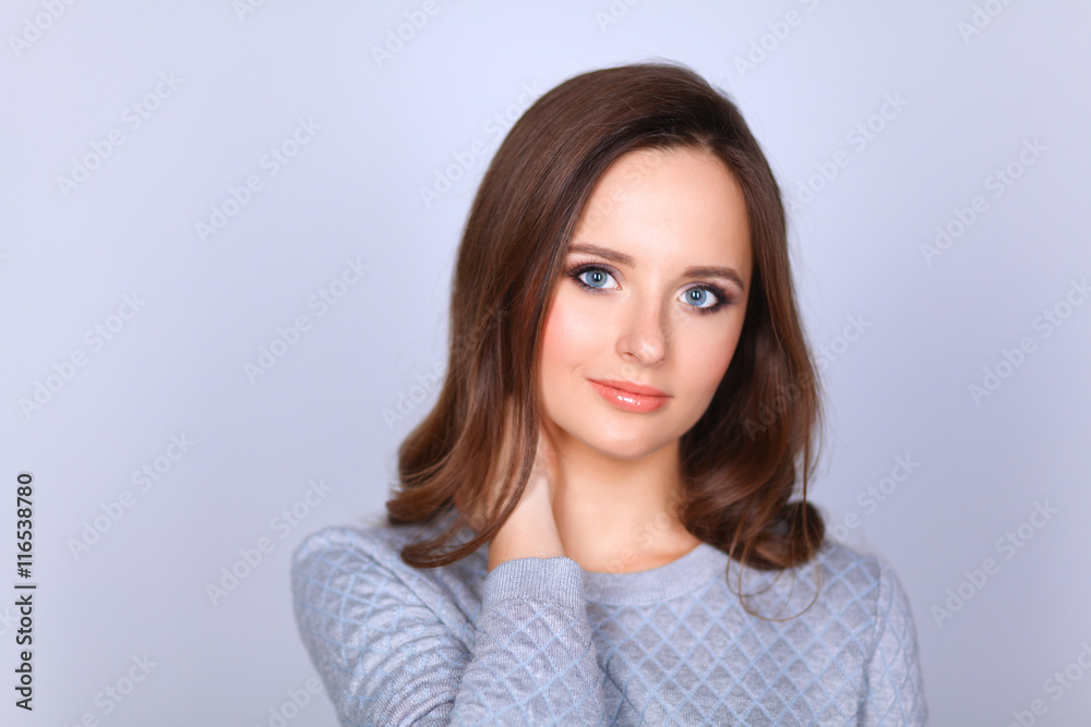 Portrait of an attractive fashionable young brunette woman Portrait of an attractive fashionable young brunette woman