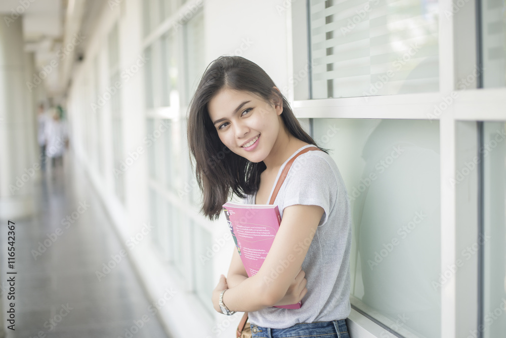 A portrait of an Asian university student on campus A portrait of an Asian university student on campus