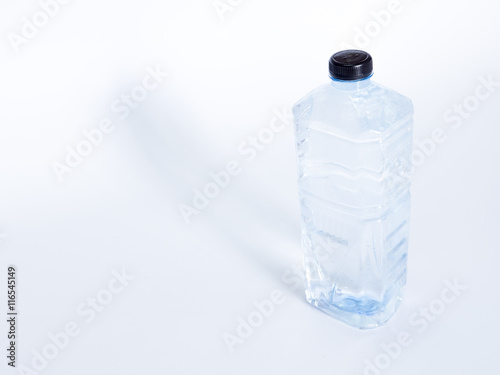 plastic water bottle on white background © InfinitePhoto