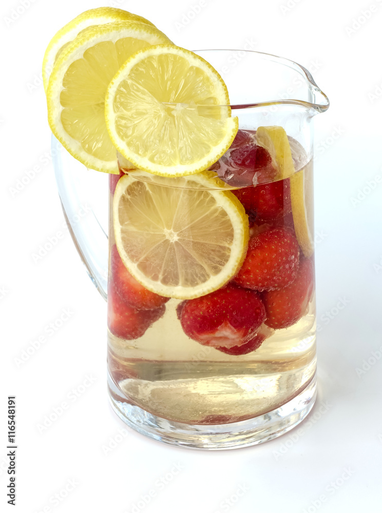 Strawberry Punch in a Glass Jug isolated on White Background Strawberry Punch in a Glass Jug isolated on White Background