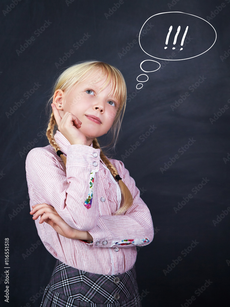 schoolchild on blackboard background