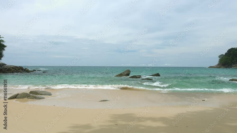 Video 3840x2160 UHD - Small tropical beach without palm trees. Only sand and stones Video 3840x2160 UHD - Small tropical beach without palm trees. Only sand and stones