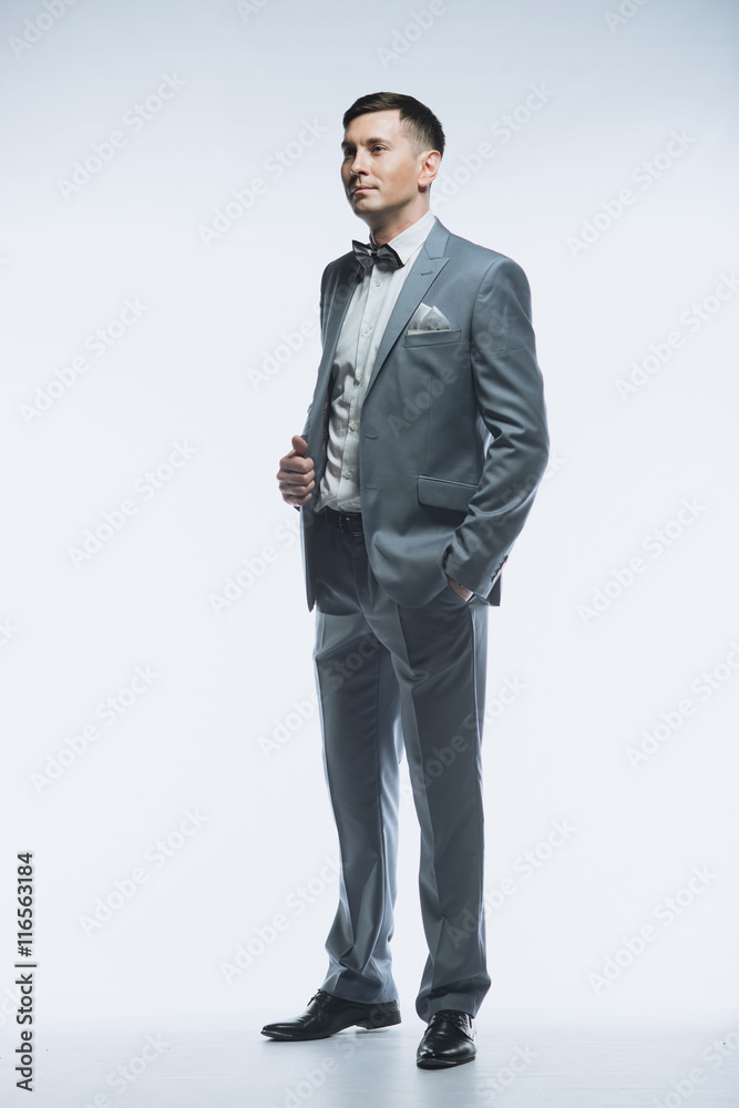 Portrait of a elegant handsome business man on white background