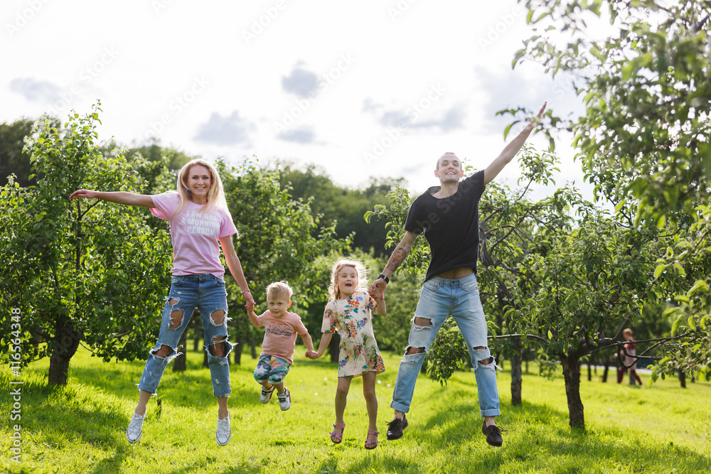 Fototapeta premium Family playing in the park